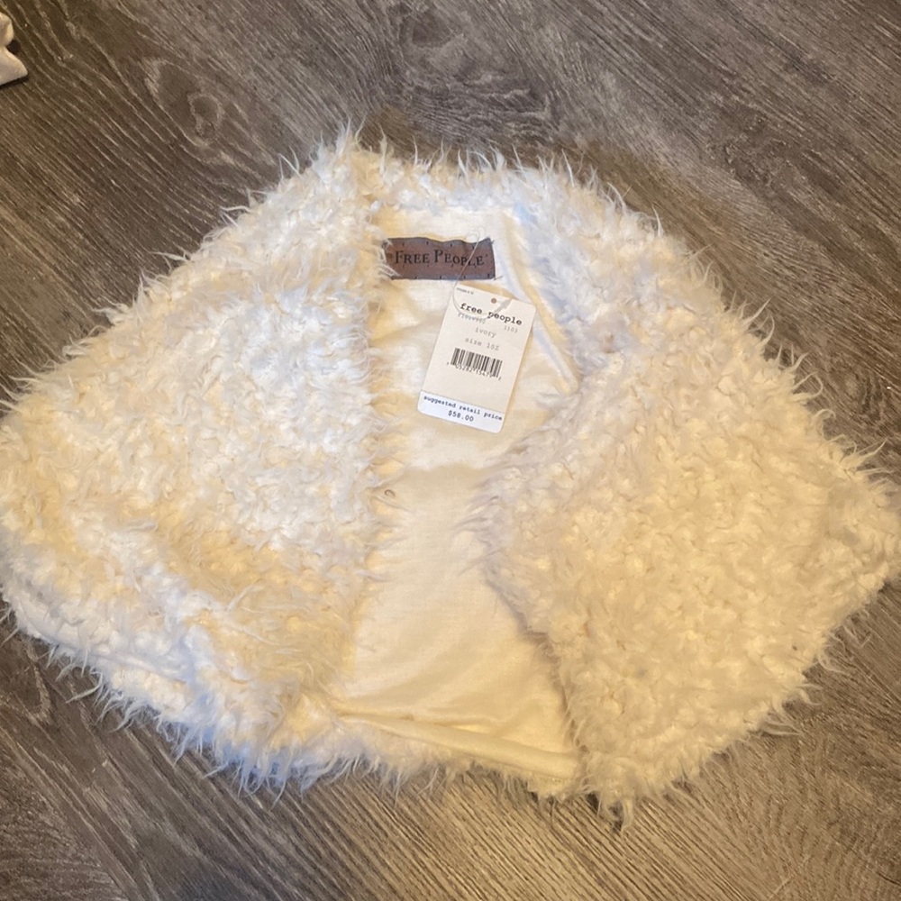 Free people shrug. Never worn.